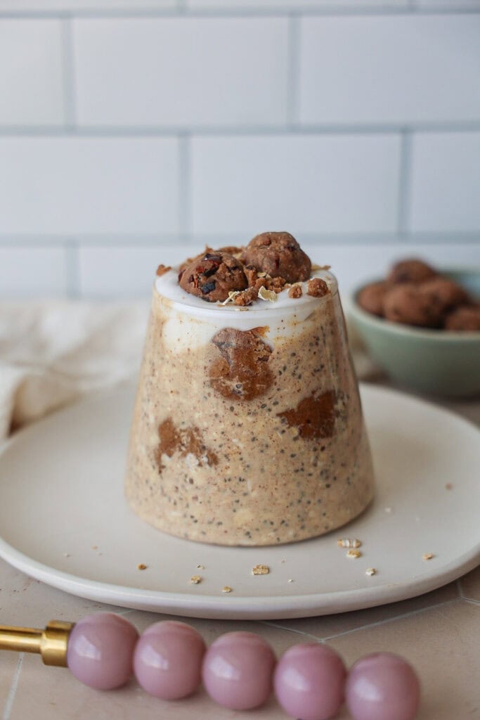 A jar of high protein, oatmeal cookie dough overnight oats.