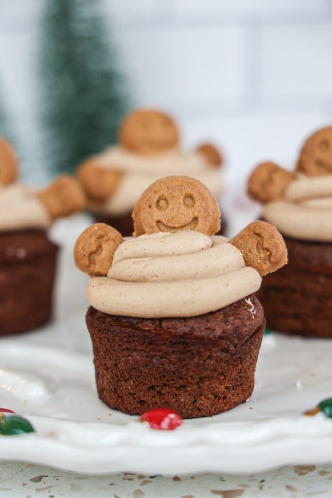 Pumpkin cupcakes with gingerbread cream cheese frosting and gingerbread men cookies.