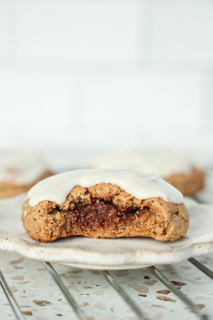a cinnamon roll cookie with cream cheese icing.