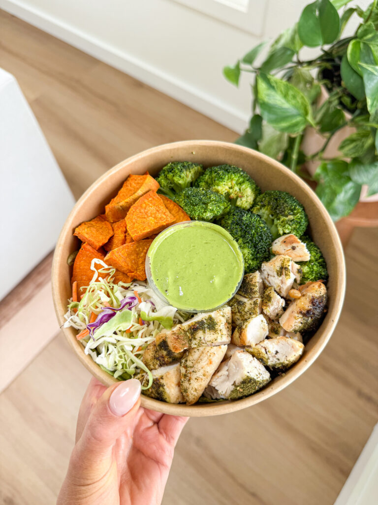 homemade sweetgreen bowl with green goddess dressing, chicken, sweet potatoes, and veggies.