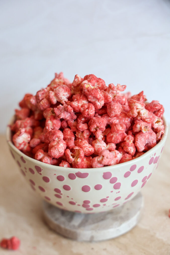a bowl of strawberry popcorn